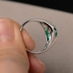 This is a gorgeous handmade creation. Its beauty is its simplicity & Elegance. The 6*6mm round shape faceted lab emerald is crafted in solid sterling silver and with rhodium plated. All item is sent in a beautiful gift box If you have any idea of design your ring,pls contact me directly. You can realize more lovely stuff clicking the link https://www.etsy.com/shop/knightjewelry?refshopsection_shophome_leftnav Please leave the correct address and you phone number for delivering successfully. Sterling Silver Open Emerald Ring As Birthstone, Emerald Diamond Promise Ring, Fine Jewelry Emerald Ring With Polished Finish, Emerald Ring With Halo Setting In Fine Jewelry Style, Emerald Ring With Prong Setting In Round Cut, Emerald Rings With Prong Setting And Round Cut, Emerald Ring With Prong Setting And Round Cut, Emerald Promise Ring In Fine Jewelry Style, Emerald Jewelry For Promise Ring With Polished Finish