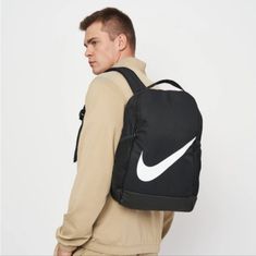 Add Some Serious Swag To Your School Day With This Nike Brasilia Black/White Backpack. Made With A Polyester Shell Containing At Least 50% Recycled Polyester Fibers, This Backpack Has A Spacious Main Compartment With Two-Way Zip Around Closure. A Large Nike Swoosh Logo At The Front And Shoulder Strap Add Iconic Sporty Vibes. Features Include A Front Zipper Compartment For Quick Access, Top Haul Loop, Side Mesh Pockets Ideal For Water Bottle Storage, And Adjustable Padded Shoulder Straps For A Co Nike White Functional Backpack, White Nike Functional Backpack, Nike White Backpack For Everyday Use, Nike Casual Backpack For Students, White Nike Backpack For Everyday Use, Casual Nike Backpack For Students, Nike White Bag For Back To School, White Nike Bag For Back To School, Nike White Standard Backpack