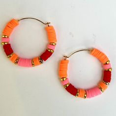 "These colorful hoop earrings are made from polymer clay heishi beads.  They are available in endless color combinations which you can choose at checkout.  This pair is the large sized hoop, 1 5/8\" diameter. This listing is for the earring shown in the first photo. this pair is vibrant in red, pink and orange. you can have them as is or choose your colors.  Choose any colors you like to match an outfit or your mood.  Don't see what you want?  Message me." Handmade Red Hoop Earrings For Beach, Pink Hoop Earrings With Colorful Beads For Beach, Pink Playful Handmade Hoop Earrings, Trendy Handmade Orange Hoop Earrings, Playful Red Jewelry With Colorful Beads, Handmade Red Hoop Earrings For Everyday, Red Handmade Hoop Earrings For Everyday, Hoop Earrings Large, Bead Hoop Earrings