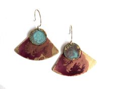 Oxidized brass metal with shades of pink, gold  and green verdigris.  Hang from gold-filled ear wires.Measurements:1.5”x1”**shades of color will vary due to the patina process.  The product pictured is a sample of what you will receive.**Handmade in the USAssd jewelry ©️ 2018 Artsy Copper Drop Earrings, Unique Multicolor Jewelry With Patina, Unique Multicolor Patina Jewelry, Artsy Copper Jewelry With Matching Earrings, Adjustable Multicolor Brass Earrings, Adjustable Multicolor Patina Jewelry, Nickel-free Bronze Artsy Earrings, Artistic Bronze Jewelry With Ear Wire, Artistic Copper Earrings With Patina