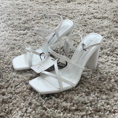 Brand New. White Sandals With 4-inch Heel For Spring, White Strappy Beach Heels, White Strappy Heels For Beach, White Strappy Sandals With Wrapped Heel, Elegant White Strappy Sandals, White Square Toe Sandals With Heel Loop, White Strappy Sandals With Heel Strap, White Sandals For Spring Evening, White Sandals For Evening In Spring