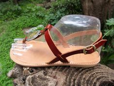 Women's comfortable and high quality sandals made from genuine cowhide leather in tan color. Strong and durable sandals adorned with Greek Meander Phaistos disc metal medallions also featuring stitched leather insoles, buckle closures and upscale new generation slip resistant rubber soles. Please check below for correct size. EU=35 (22.5 cm)UK=2US=4 EU=36 (23 cm)UK=3US=5 EU=37 (24cm)UK=4US=6 EU=38 (25cm)UK=5US=7 EU=39 (25.5cm)UK=6US=8 EU=40 (26cm)UK=7US=9 EU=41 (27cm)UK=8US=10 EU=42 (27.5cm)UK=9 Phaistos Disc, Greek Meander, Handmade Sandals, Leather Sandals Women, T Strap Sandals, Stitching Leather, New Generation, T Strap, Tan Color