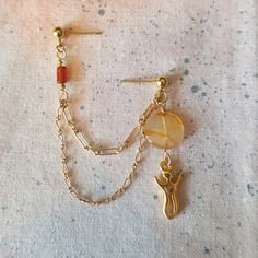 "Perfect for solar/solstice ceremonies/rituals or just for wear during the Spring & Summertimes.  Matching earrings are here: https://www.etsy.com/listing/163539764/carnelian-sun-dragonfly-earringssingle Listing is for a double (2) pierced post earring that can be worn on the top part of the ear through the cartilage and/or the lobe.  The stone is Carnelian, the chain is 2\" and 2 1/2\" inches long (5 cm and 7 1/2 cm long).  The dangle is 1/2\" (4 cm). We can substitute wires/french hooks for th Spiritual Single Earring Jewelry Gift, Spiritual Style Single Earring For Gift, Adjustable Spiritual Single Earring, Wire Wrapped Dangle Cartilage Earrings As Gift, Spiritual Metal Plug Earrings As Gift, Spiritual Style Single Dangle Earring, Adjustable Nickel Free Spiritual Plug Earrings, Nickel-free Spiritual Plug Earrings, Bohemian Wire Wrapped Cartilage Earrings Gift