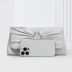 Date night coming up? This classic clutch bag is guaranteed to amp up your dinner look. Featuring pretty detailing, this bag has a luxe satin style finish that gently cradles your night out essentials. Finished with an optional chain strap for easy bar hopping.Width (cm): 6 cmHeight (cm): 12 Color: SilverInterior Material: PolyesterMaterial_bag: NylonBagType: Clutch bag & Shoulder bagBag Length: 26 cm Elegant Clutch Bag For Dinner, Chic Silver Envelope Evening Bag, Elegant Envelope Clutch For Wedding Guest, Formal Silver Envelope Evening Bag, Elegant Satin Clutch Bag, Elegant Satin Evening Bag For Formal Occasions, Elegant Satin Evening Bag, Silver Envelope Evening Bag, Satin Clutch Evening Bag For Events