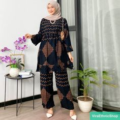 "Material: Rayon Cotton Size Details: - Chest circumference 120 cm - Shirt length 90 cm - Pants length 100 cm - Thigh circumference 74 cm - Waist circumference 75-120 cm Please leave your PHONE NUMBER in the \"note to seller\" at checkout for SHIPPING PURPOSE" Bohemian Printed Tunic Set, Bohemian Black Sets With Printed Motifs, Bohemian Patterned Sets For Eid, Black Long Sleeve Sets With Traditional Patterns, Casual Black Sets For Eid, Bohemian Sets With Batik Print For Festive Occasions, Bohemian Patterned Long Sleeve Sets, Traditional Long Sleeve Sets With Batik Print, Printed Long Sleeve Tunic For Eid