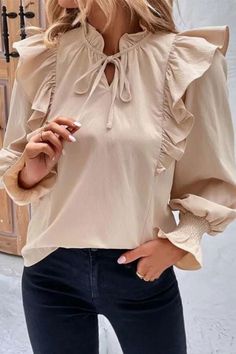 Elevate your style with our Women's New Ruffled Long Sleeve Solid Color Blouse. This chic blouse seamlessly blends fashion and elegance. With its stylish ruffled details and classic solid color design, it's the perfect choice for a sophisticated and timeless look. Upgrade your wardrobe with this fashionable and versatile addition, suitable for various occasions and seasons. Trendy Ruffled Blouse For Brunch, Beige Ruffle Sleeve Top For Fall, Trendy Ruffled Lantern Sleeve Tops, Trendy Ruffle Sleeve Blouse With Ruffles, Ruffled Blouse For Brunch, Trendy Ruffled Collar Blouse For Fall, Trendy Fall Blouse With Ruffled Collar, Fall Solid Tops With Ruffled Collar, Fall Tops With Ruffled Collar