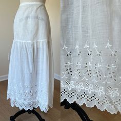 I love when I am able to find a variety of sizes in antique clothes! this petticoat has a 31' waist and would be very wearable as a skirt or underskirt. yoked top and full machine embroidered bottom. hook and eye back closure. it has been gently hand cleaned. Antique clothing must be worn with extreme care as fabrics tend to get more fragile with age. There may be some small tears or discolorations I missed. please look carefully at photos as they are part of the description. Waist 31 hip 50+ sl Daywear Ruffled Petticoat, Vintage White Skirt With Attached Cancan, Summer Cotton Skirt With Attached Cancan, Vintage Dress With Gathered Tiered Skirt, Daywear Dresses With Gathered Skirt, Vintage Petticoat With Attached Cancan For Summer, Vintage Full Skirt Dress With Ruffles, Vintage Gathered Skirt For Wedding, Vintage Skirted Dresses For Spring