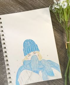 a drawing of a woman wearing a blue hat and scarf next to a bouquet of flowers