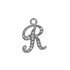 Personalize it! Clear crystals add sparkle to this lovely silver tone monogram initial charm. A lovely, personalized accessory that you can wear as a pendant or on a charm bracelet. Round Clear Crystal Accents Measurements: 1"L x 0.5"W Buy Charm Bracelet 1928 Jewelry Collection From the vaults of rich European capitals to the antique laden attics of old American estates, 1928 Jewelry has created modern replicas of the most beautiful, exquisite vintage jewelry ever made. For those who love all th Elegant Silver Charms With Initials, Silver Nickel-free Initial Pendant Charms, Nickel-free Silver Initial Pendant Charms, Elegant Silver Charms For Personalized Gifts, 1928 Jewelry, Personalized Accessories, Jewelry Crystal, Clear Crystals, Initial Charm