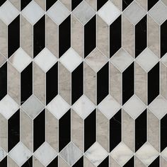 an abstract black and white tile design