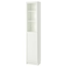 a tall white cabinet with two shelves