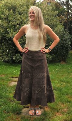 Ninetees vintage skirt. Real brown suede leather  a-line maxi skirt. Size S. European (nl )size 38/40  The model is 1.72m  (see size table to convert in US and English sizes) This skirt has fine embroidery on it. And has a beige lining.  It's very soft and very comfortable. It closes with a zipper. Shipping is without track and trace. If you wish to ship it with track and trace, please contact me. Brown Full Length Maxi Skirt For Fall, Fitted Wide Leg Brown Maxi Skirt, Fall Full Length Brown Maxi Skirt, Suede Maxi Skirt, Brown Cotton Maxi Skirt With Lining, Brown Full-length Maxi Skirt For Fall, Winter Brown Lined Maxi Skirt, Fitted Brown Lined Maxi Skirt, Brown A-line Maxi Skirt With Lining