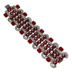 Formal Crystal Bracelets With Stones, Modern Crystal Bracelets For Party, Formal Crystal Bracelet, Formal Crystal Jubilee Bracelet, Crystal Stone Bracelet Jewelry, Formal Jeweled Crystal Bracelets, Luxury Jeweled Crystal Bracelets, Red Crystal Bracelets With Rhinestones, Elegant Red Crystal Bracelet