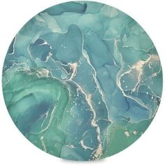 a round plate with blue and green marble on it