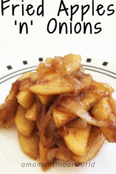 fried apples in onions on a white and black plate