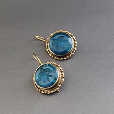 ✽ D E T A I L S   {Gemstone} - Blue Glass   { Metal  } -  BRASS   {Gemstone Size} - 18 mm   {Earring Height Including Hoop} - 4.2 cm   {Earring Width} - 2.8 cm   {Finish} - Smooth and high polished with brilliant shine.   {Note} -The earrings are made to order, production day is about 3-5 working days. The one you receive may be slight different from the one                  in the picture due to handmade nature, but it will be almost same as in the above picture.    These pieces are handcrafted Vintage Blue Hoop Earrings For Gift, Blue Vintage Hoop Earrings As Gift, Blue Vintage Hoop Earrings For Gift, Blue Vintage Hoop Earrings For Gifts, Blue Brass Jewelry For Wedding, Brass Clip-on Earrings As Gift, Brass Clip-on Earrings For Gift, Round Brass Bridal Earrings Gift, Antique Ear Wire Earrings For Wedding