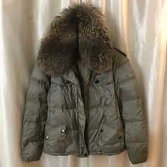 Authentic Burberry Down Jacket With Fur Collar And Hidden Hood. No Holes, Rips Or Stains. Missing Belt. * Please Ask All Questions Before Offer Or Purchase. * Reasonable Offers Considered. * Be Sure To Bundle For Additional Savings!!! * Check Out My Closet For Chanel, Dior, Louboutin, Gucci, Vuitton, Fendi And More! Burberry Puffer Jacket Women, Burberry Puffer Jacket, Burberry Puffer, Jacket With Fur Collar, Puffer Jacket With Fur, Jacket With Fur, Hidden Hood, Burberry Jacket, Fur Collar