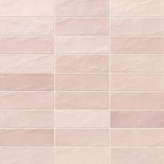 a white and pink tiled wall with no one in it