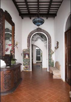 an entry way with tiled floors and walls