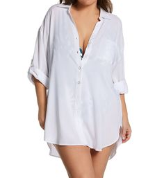 Button up this long-sleeved shirt over your swimsuit for a fabulous look as you head to the pool or beach. Sleeves are adjustable and can be rolled up with hidden fabric tab and button. Open standard collar gives shirt a modern look. Five functional logo buttons secure the front. Center of back has pleat for a flowing look. Small pocket is sewn onto left chest. Long, dropped sleeves have 2-ply cuffs that close with one logo button. Adjustable sleeve rolls up and stays in place with inner fabric Relaxed Fit Long Sleeve Top For Beach Cover-up, Summer Long Sleeve Shirt With Button Closure, Oversized Long Sleeve Beach Top, Oversized Long Sleeve Tops For Beach, Oversized Long Sleeve Tops For The Beach, White Long Sleeve Swimwear For Pool, Long Sleeve Beach Shirt With Button Closure, Long Sleeve Tops For Summer Beach Cover-up, Solid Color Beach Top With Button Closure