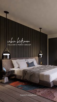 A stylish, modern cabin bedroom with dark wood paneled walls, a cozy bed layered with textured blankets, and minimalistic pendant lights hanging on either side. The decor combines rustic and modern elements, creating a warm and inviting retreat atmosphere. Modern Cabin Bedroom, Dark Wood Paneling, Modern Mountain Cabin, Bedroom Vibes, Cabin Retreat, Black Fireplace, Cabin Bedroom