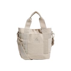 Carry whatever essentials you need in this adidas corduroy mini tote bag. FEATURES Corduroy construction Crossbody strap adjusts up to 54 in. Can be worn over the shoulder or as a crossbody 1 exterior slip pocket 1 interior zip pocketDETAILS 9"H x 5"W x 8"L Weight: 0.74 lbs. Polyester Hand wash, line dry only Imported Size: One Size. Color: Wonder Beige. Gender: female. Age Group: adult. Color Wonder, Clothes Making, Mini Tote Bag, Mini Tote, Cute Bag, Pocket Detail, Sewing Clothes, Bags Backpacks, Handbag Accessories