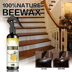 a bottle of beewax sitting on top of a set of stairs next to a banister