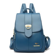 Color: Blue Solid Color Leather Travel Bag, Leather Travel Bag In Solid Color, Solid Leather School Bag, Large Capacity Leather Backpack In Solid Color, Large Capacity Solid Leather Backpack, Trendy Blue Faux Leather Bag, Large Capacity Blue Leather Backpack, Solid Leather Backpack, Casual Blue Leather Backpack With Zipper