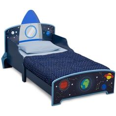 a child's bed with a space theme on the side and a blue headboard