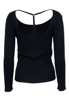 This isn't just your average knit top. The harness design detail at the back adds a punky little vibe to this simple and classic silhouette. We would love to see this stretch knit paired with high waisted jeans and Doc Martens for the best cool chick ensemble. Size L 62% Viscose, 38% Polybutylene Unlined Pullover Long sleeves Round neckline Harness detail at back Bust 30" Waist 22" Shoulder to hem 23" Stretch Fine Knit Top For Night Out, Black Elastane Top For Winter, Black Elastane Tops For Winter, Edgy Ribbed Stretch Tops, Trendy Fitted Fine Knit Top, Fitted Black Ribbed Knit Top, Black Stretch Knit Top With Scoop Neck, Chic Seamless Winter Top, Black Ribbed Elastane Tops