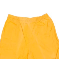 Item is in good used condition. >Size: M >Waist Size: 30" >Inside Leg: 9" >Rise: 14" >Hem: 13" 90s Style Bottoms With Built-in Shorts, Relaxed Fit Yellow Bottoms With Built-in Shorts, 90s Stretch Cotton Bottoms, Vintage Long Pants For Summer, Vintage Stretch Bottoms With Elastic Waistband, Vintage Stretch Short Length Bottoms, 90s Cotton Bottoms, High Waist 90s Style Pants For Summer, 90s High Waist Pants For Summer