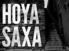 the words hoya saxa are painted on a brick wall next to some stairs