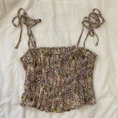 Cropped Paisley Cami From Mango With Tie Straps. Has Some Smocking At The Waist. Took The Tags Off But Never Worn! Would Fit Xs-S. Multicolor Sleeveless Smocked Top With Floral Print, Multicolor Sleeveless Smocked Summer Top, Summer Multicolor Sleeveless Smocked Top, Fitted Sleeveless Bohemian Smocked Top, Multicolor Sleeveless Smocked Top Casual, Sleeveless Multicolor Smocked Top, Multicolor Sleeveless Smocked Top, Casual Multicolor Sleeveless Smocked Top, Paisley Print Tops For Spring And Summer