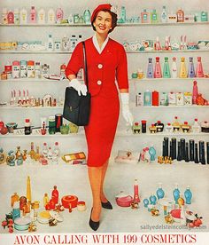 a woman in a red dress and white gloves is holding a black purse while standing in front of shelves with cosmetics