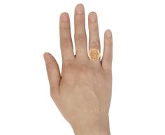 With its playful design and symbolic sentiment, this Retrouvai signet ring is a talismanic update on the traditional. The solid 14K yellow gold signet has a wavy exterior and is engraved with the words "growth not perfection" to remind us that life is about the journey. The signet is centered on the polished 14K yellow gold band and would look stunning worn on any of your fingers. 14K yellow gold ring face : just under 7/8" diameter14K yellow gold band width : 3.5size available : 6.5please conta Luxury Gold Citrine Signet Ring, Luxury Citrine Signet Ring For Gift, Luxury Citrine Signet Ring As Gift, Luxury Oval Spiritual Signet Ring, Luxury Yellow Signet Ring For Gift, Tulip Ring, Sevan Bicakci, Gold Oval Ring, Rebecca Overmann