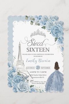 a princess themed birthday party with blue roses and the eiffel tower in the background