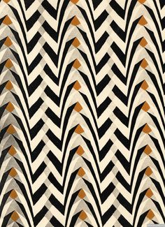 an abstract black and white pattern with gold accents on the edges, in shades of orange