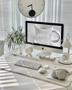 a desktop computer sitting on top of a white desk