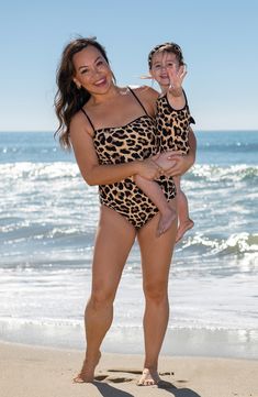 This reversible swimsuit features a square neck, moderate coverage and an adjustable back tie closure. Moderate back coverage Lined 83% nylon, 17% spandex Hand wash, line dry Imported Beach Bodysuit With Square Neck And Stretch, Beach Bodysuit With Square Neck And Stretch Fit, Stretch Bodysuit With Square Neck For Beach, Square Neck Stretch Bodysuit For Beach, Square Neck Bodysuit For Beachwear, Square Neck Beachwear Bodysuit For The Beach, Square Neck Beachwear Swimwear For Poolside, Square Neck Beachwear For Poolside, Square Neck Swimwear For Beach Season Sunbathing