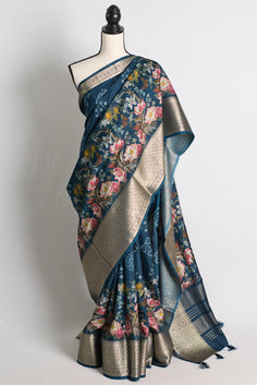 Blended Silk Printed Saree in Blue and Metallic Gold Fitted Blue Saree With Printed Motifs, Blue Floral Print Saree With Traditional Drape, Fitted Blue Floral Print Saree, Blue Art Silk Saree With Printed Motifs, Unstitched Blue Floral Print Saree, Blue Floral Print Unstitched Saree, Bollywood Style Blue Floral Saree, Blue Silk Saree With Printed Motifs, Festive Blue Saree With Printed Motifs