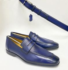 Mezlan Deerskin Penny Loafer Blue Dress Casual slip-on Penny Loafer from the Mezlan collection in Supple Deerskin features soft Calfskin lining, their injected comfort insole, and a Lightweight Super Flex Sole! Handmade in Spain. Matching belt available. Classic Blue Slip-ons For Business, Blue Formal Slip-ons With Leather Sole, Formal Blue Slip-ons With Leather Sole, Blue Leather Loafers, Elegant Blue Leather Slip-ons, Blue Elegant Leather Slip-ons, Elegant Blue Slip-ons For Formal Wear, Elegant Blue Slip-ons For Formal Occasions, Elegant Blue Slip-ons For Work