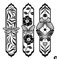 three decorative bookmarks with flowers on them