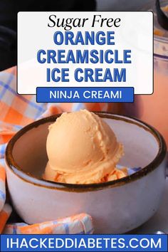 an ice cream in a bowl with text overlay that reads sugar free orange cremesicle ice cream