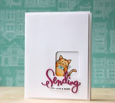 a white card with a cat on it that says sending you love's hugs