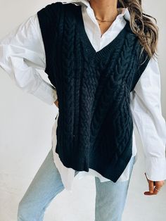 DETAILS: Our Knitted Oversized Vest has a soft and cozy knitted fabric that has an oversized fit. There is a deep v neckline that is outlined with a ribbed look. There is also a ribbed look on the hem and around the opening for the arms. There are two side slits for an open look. This vest does have an oversized look but fits true to size and our model is wearing a small! CONTENT & CARE: SELF: 42% Acrylic, 30% Polyester, 28% Nylon. SIZE & FIT: Model is 5'6" The model is wearing a size Small. Fit Trendy V-neck Cable Knit Cardigan, Trendy Ribbed V-neck Cardigan, Ribbed V-neck Sweater For Winter Loungewear, Casual Chunky Knit V-neck Sweater For Layering, Casual V-neck Cable Knit Sweater Vest, V-neck Textured Knit Cardigan For Layering, V-neck Ribbed Sweater For Layering, Casual Cable Knit V-neck Sweater For Layering, Cozy Soft Knit V-neck Sweater For Work