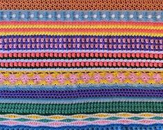 multicolored crocheted fabric with horizontal stripes