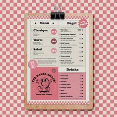 a menu with pink and white checkered paper