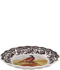 a white and black plate with a bird on it