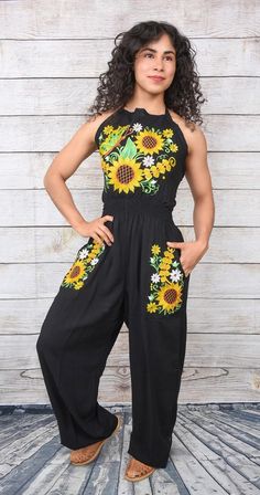 This Beautiful Capri Jumpsuit boasts a Traditional Mexican floral design combined with a modern style.  The embroidered bodice with lace details combined with the halter top makes it fun and flirty.  It's made out of fine Mexican cotton. All items are custom made to order. Our turn around time is about 5-10 business days.  This can change during peak season.  We want you to be happy doing business with us so any questions, any concerns are welcome.  We are fast to reply! Shipping:  *We take grea Mexican Jumpsuit, Embroidered Fitted Sleeveless Jumpsuits And Rompers, Embroidered Cotton Jumpsuits And Rompers For Summer, Casual Embroidered Jumpsuits And Rompers For Spring, Spring Embroidered Fitted Jumpsuits And Rompers, Spring Embroidered Cotton Overalls, Embroidered Fitted Jumpsuits And Rompers For Spring, Embroidered Cotton Jumpsuits And Rompers For Spring, Sleeveless Embroidered Jumpsuits And Rompers For Summer