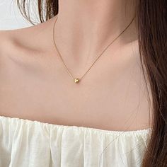 Metals Type : zinc Alloy Fine or Fashion : fashion Product Description:1.Product name: Heart Minimalist Necklace2.Product size: Necklace length:50cm(19.69in),Pendant size:8*8mm(0.31*0.31in)3.Product style: as shown in the picture4.Product color: Golden,Silvery5.Product material: AlloyFeatures:1.Unique and stylish: This heart pendant necklace for women is a trendy and distinctive accessory that embodies the cool and minimalist aesthetic of the fashion.2.Minimalist design: The simple and understat Round Pendant Heart Necklace With Clavicle Chain, Gold Heart Charm Necklace In Alloy, Gold Alloy Necklace With Heart Charm, Gold Alloy Heart Necklace, Minimalist Alloy Charm Necklace With Delicate Chain, Alloy Charm Necklace With Clavicle Chain, Gold Heart-shaped Alloy Necklace, Alloy Clavicle Chain Charm Necklace, Clavicle Chain Charm Necklace In Alloy